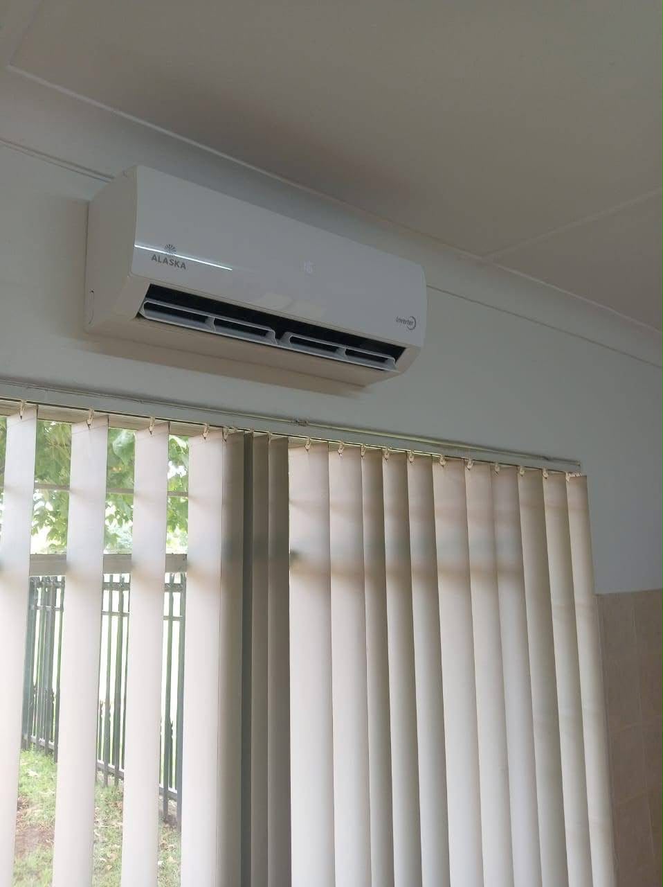 Indoor air conditioner installed above vertical blinds in Gauteng