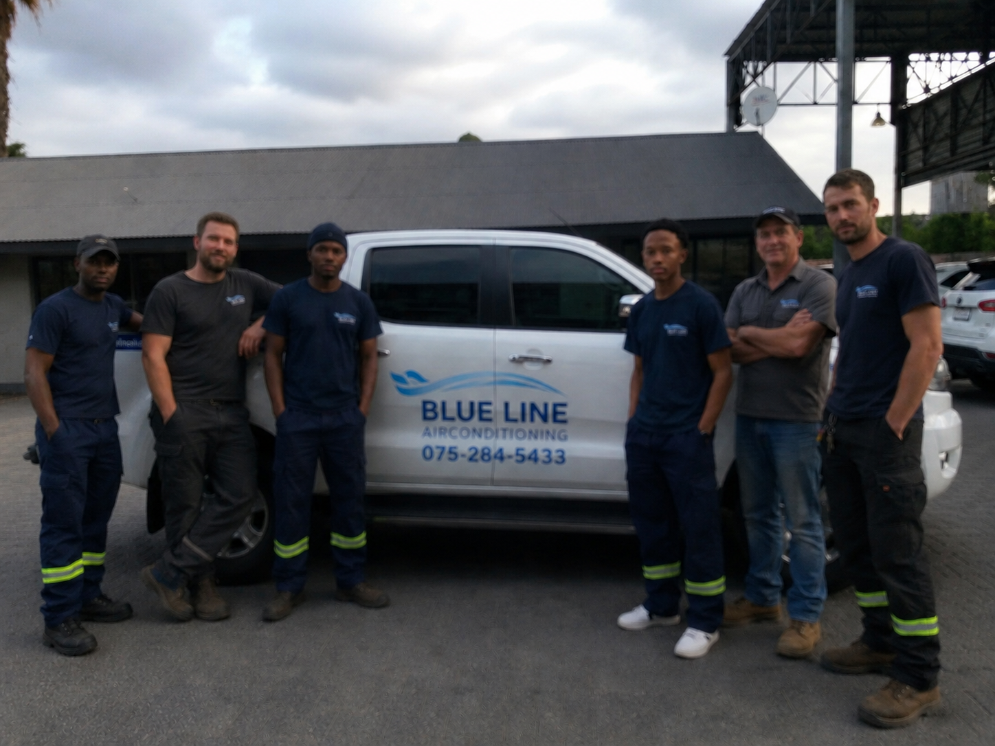 Blue Line Air Conditioning installer with company vehicle — professional AC installation team in Gauteng