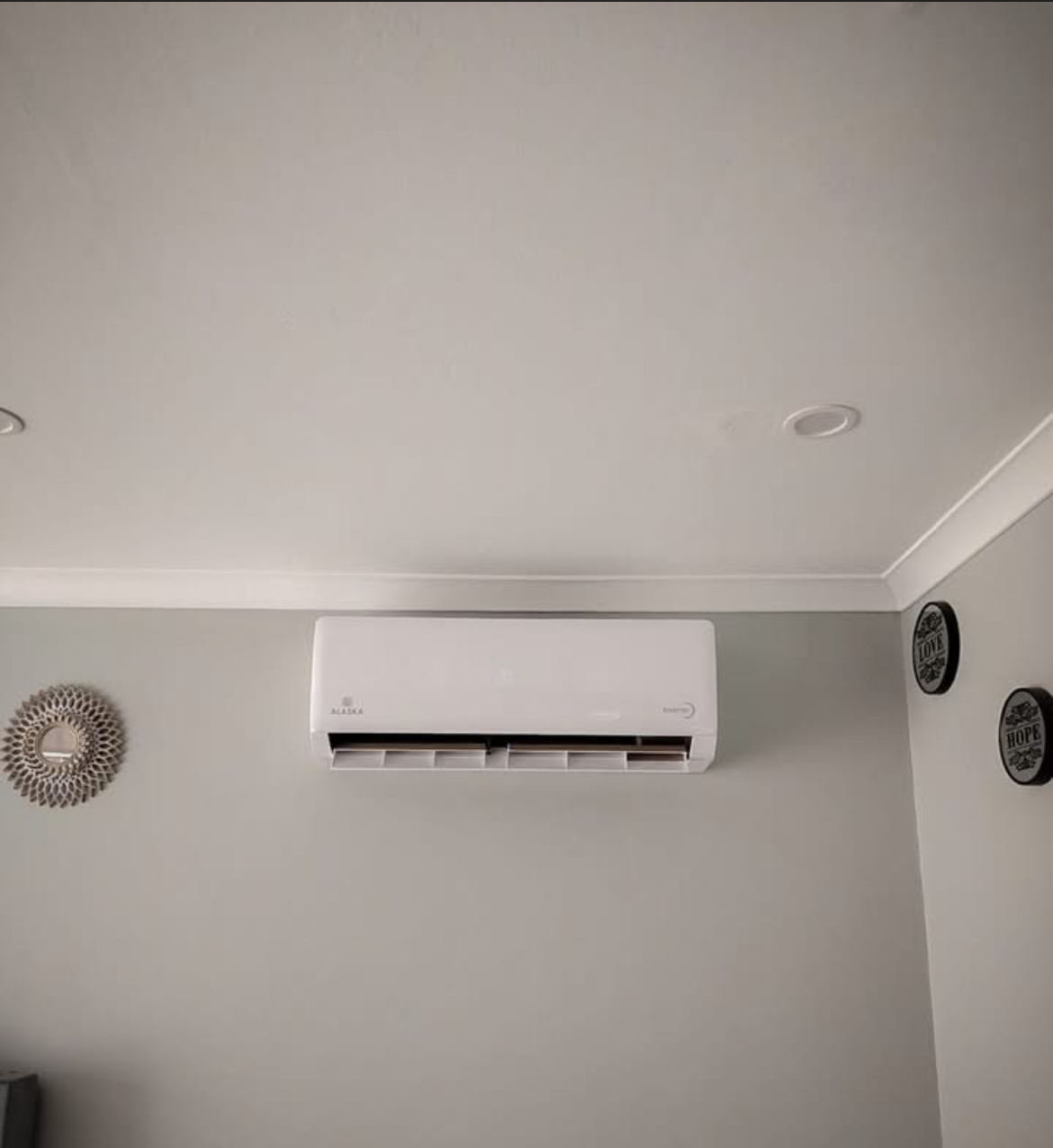 Alaska air conditioner aircon installed in a bright modern bedroom