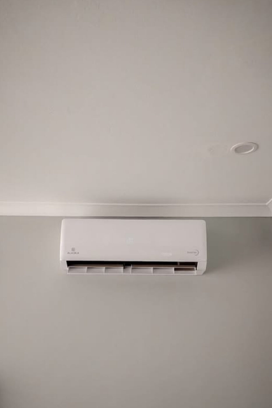 Alaska Air Conditioner neatly installed by Blue Line Air Conditioning